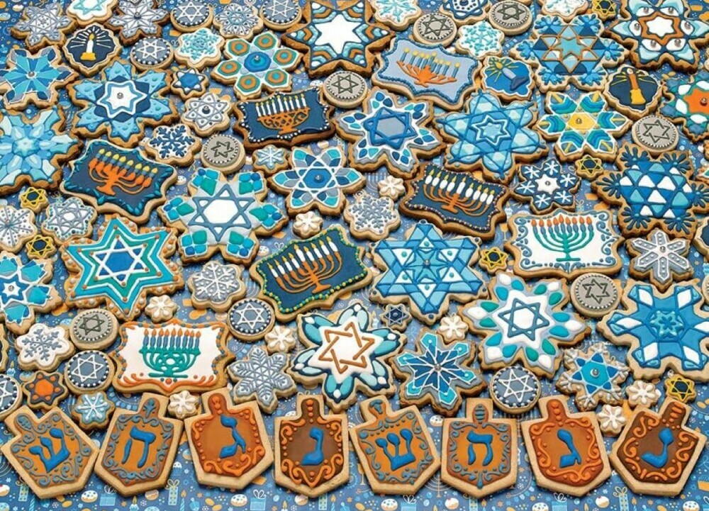 Cookies with various Jewish symbols to represent religious jigsaw puzzles.