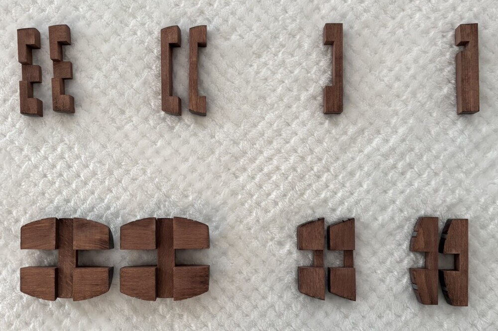 Wooden barrel puzzle pieces disassembled and arranged according to shape